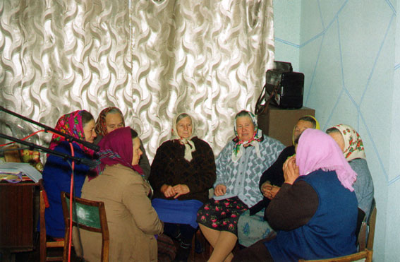 Women folk choir. Mutyn village, Ukraine. Quick rehearsal